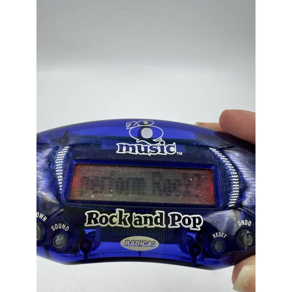 Set of 2 Radica 20Q Handheld Electronic Games Regular and Rock and Pop Music